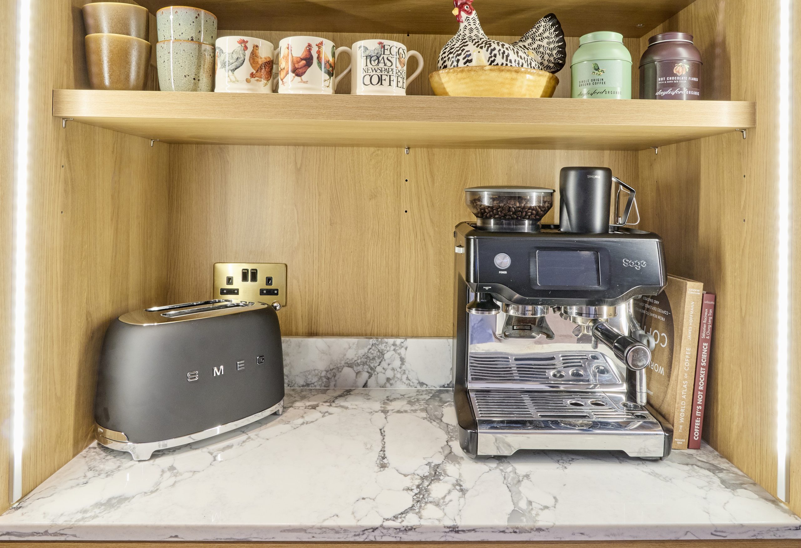 A modern breakfast pantry with CRL Arabescato Vagli quartz stone. Perfect for an invisible kitchen.